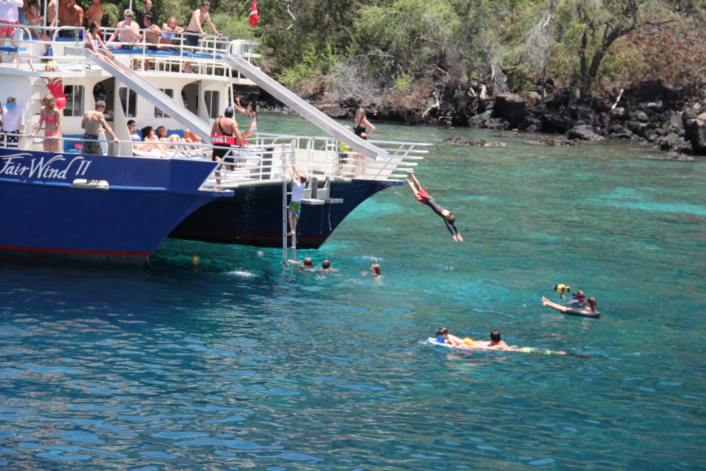 Fair Wind Morning Snorkel Tour Playing In Water