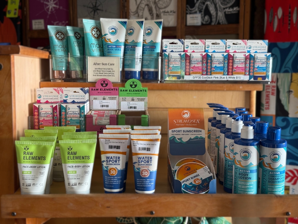 Bottles of reef safe sunscreen on Fair Wind's store shelf.