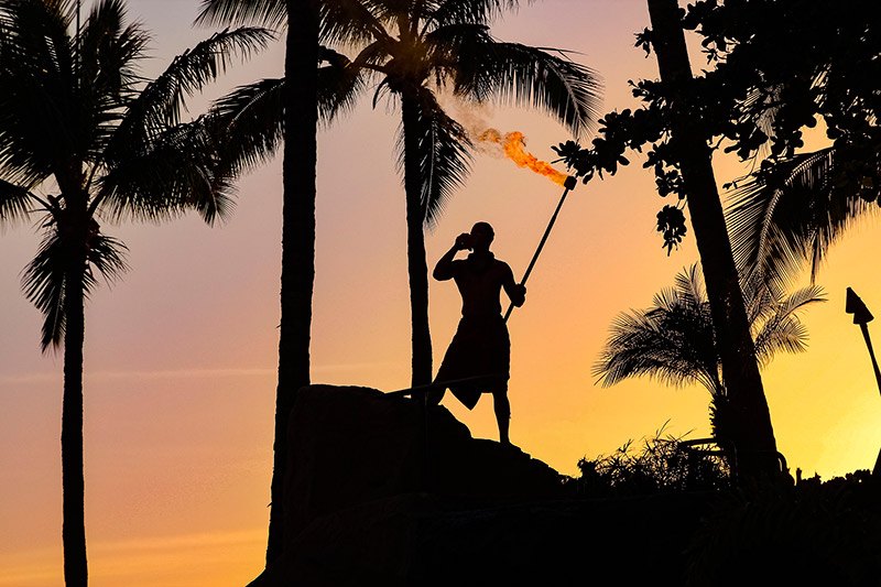 Luau Performer Sunset Torch and Conch